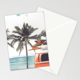 Vintage car parked on the tropical beach seaside with a surfboard on the roof - Leisure trip in the summer. Retro color effect Stationery Card