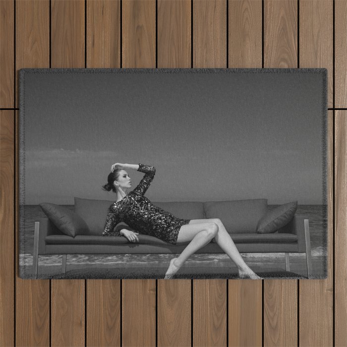 Home is wherever my couch is; female model on couch at the beach black and white photograph - photography - photographs Outdoor Rug
