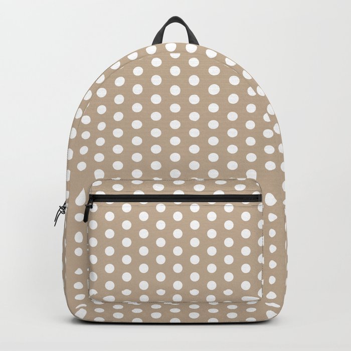 white and brown backpack