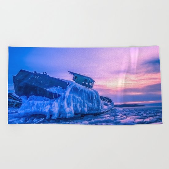 Frozen boat Beach Towel