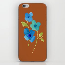 Blue Flowers On A Burnt Orange Background iPhone Skin