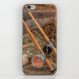 Two salmon spey fly rods resting on a log in the late afternoon sun, in British Columbia, Canada iPhone Skin