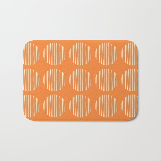 Circle stripes on orange Bath Mat