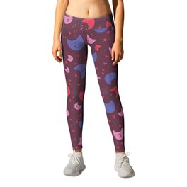 Cat heads on a rose background Leggings