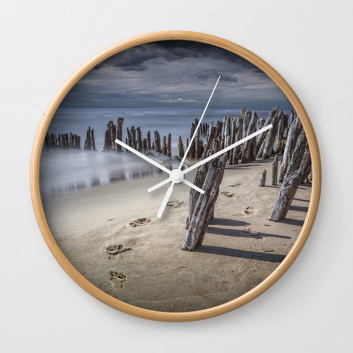 Footprints and Pilings on the Beach at Kirk Park by Grand Haven Michigan Wall Clock