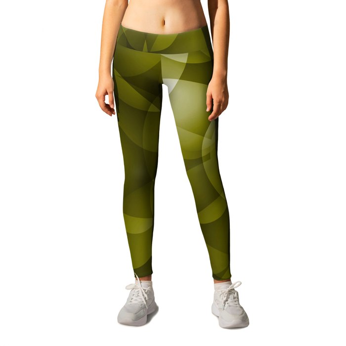 Dark intersecting translucent olive circles in bright colors with an oily  glow. Leggings by Grachyhamr