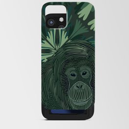 Orangutan in the jungle sitting on a green abstract leafy pattern background iPhone Card Case