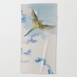 A Parakeet Soars Through The Clouds Beach Towel