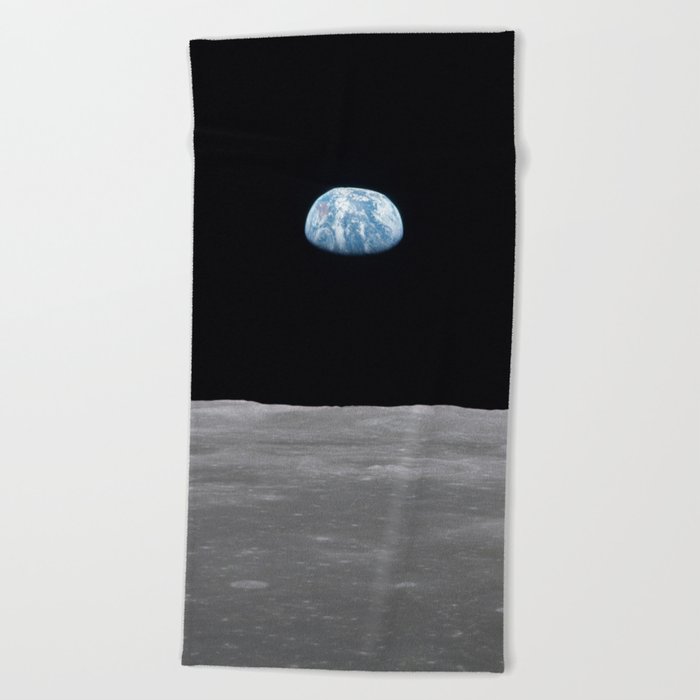 Earth rise over the Moon Beach Towel