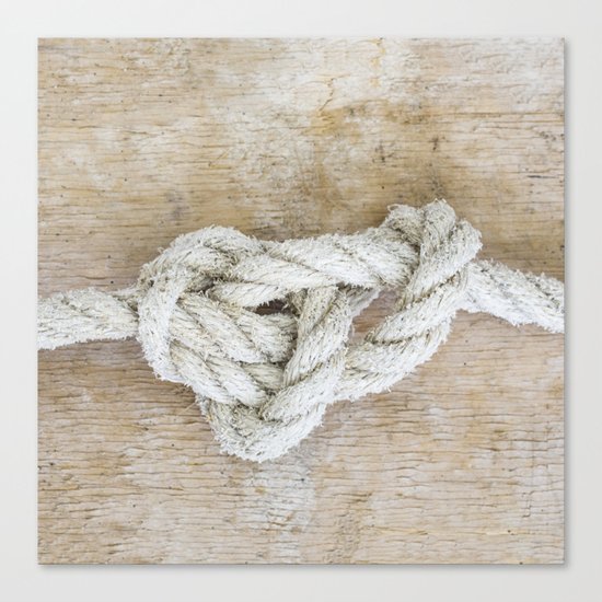 Knot on driftwood Canvas Print