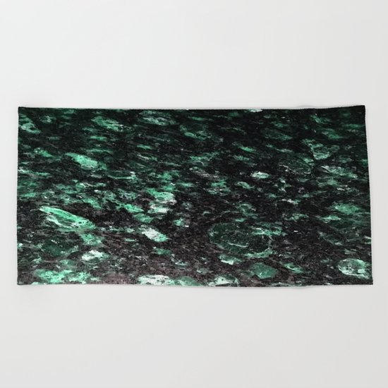 The Jade Sleeping Beneath the Black Granite Beach Towel