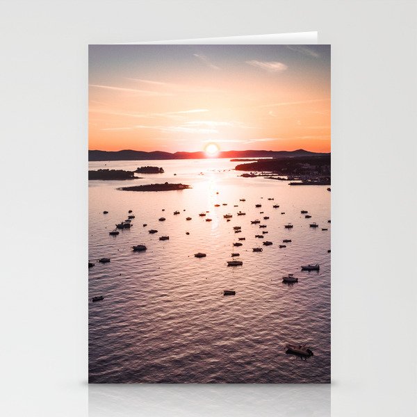 Dramatic sunset on the sea coast with boats in the sea Stationery Cards