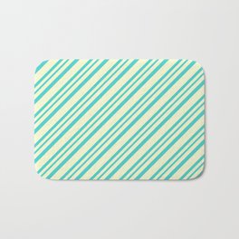 [ Thumbnail: Light Yellow and Turquoise Colored Lined Pattern Bath Mat ]