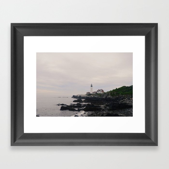 Lighthouse on the coast Framed Art Print