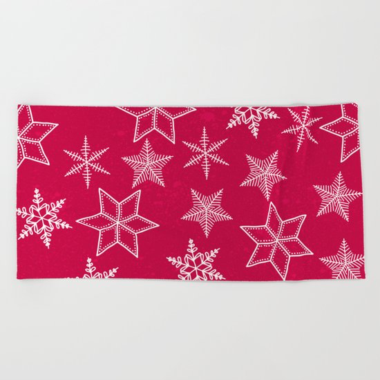 Snowflakes on red background Beach Towel