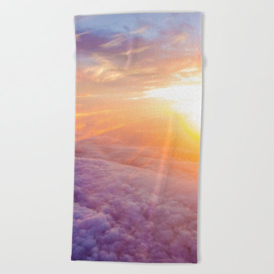 up in the clouds Beach Towel
