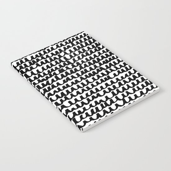 Black Wave Lines on White Notebook