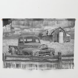 Black and White of Rusted International Harvester Pickup Truck behind wooden fence with Red Barn in Wall Hanging