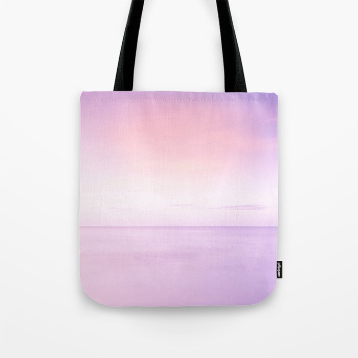 Calmness in pink and blue at ocean, horizon and smooth surface Tote Bag
