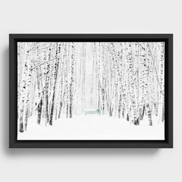Green bench in white winter forest Framed Canvas