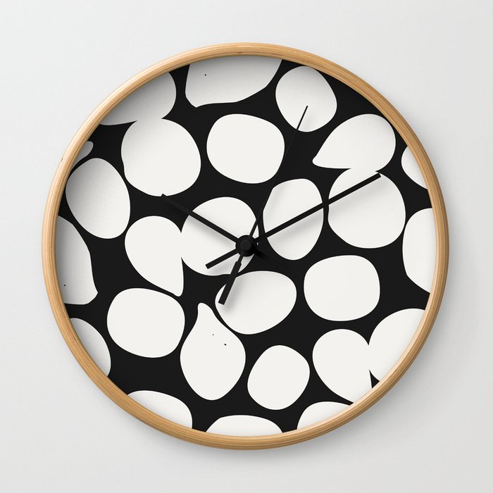 Black and white contrasting pattern with petals Wall Clock