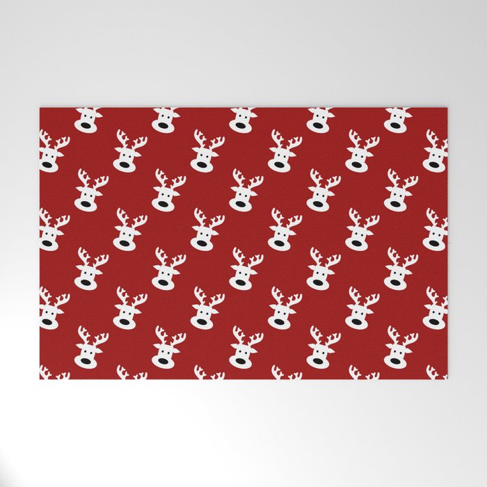 Reindeer on red background Welcome Mat