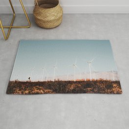 Wind turbine in the desert with summer blue sky at Kern County California USA Rug