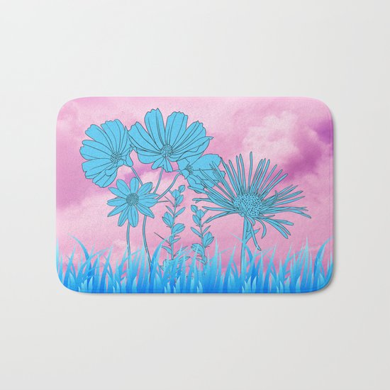Flowers in grass Bath Mat