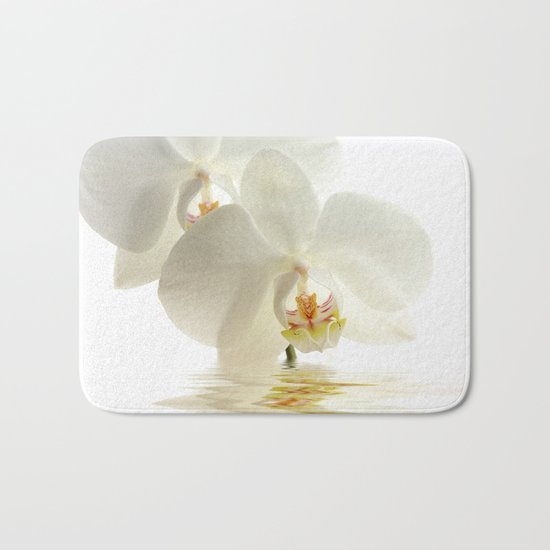 Orchid in a bath Bath Mat