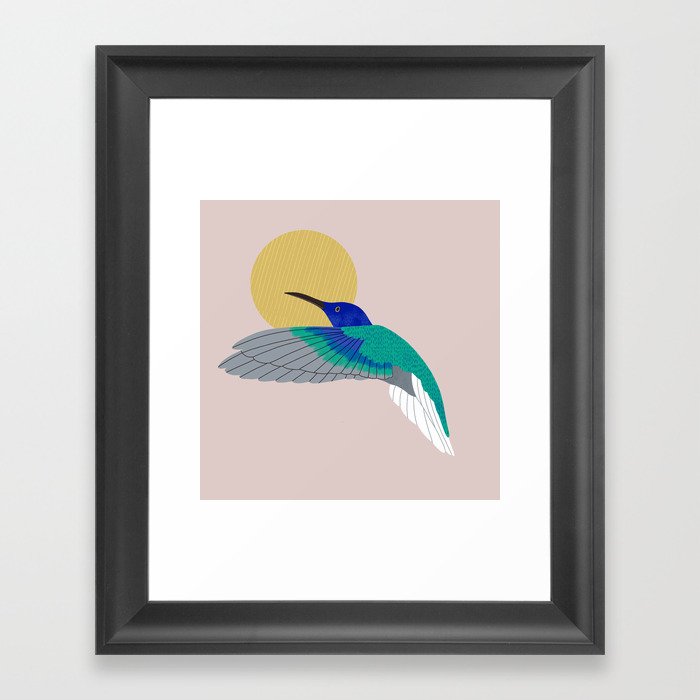 Humming bird flying to the sun Framed Art Print
