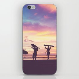 Silhouette Of surfer people carrying their surfboard on sunset beach, vintage filter effect with soft style iPhone Skin