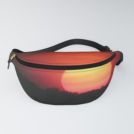 Dramatic Sunset over the Forest Fanny Pack