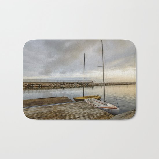 Sunrise on the marina Bath Mat
