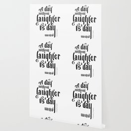 A day without laughter is a day wasted - Charlie Chaplin - Quote to Motivate & Inspire Wallpaper