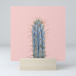blue cactus with pink background Mini Art Print