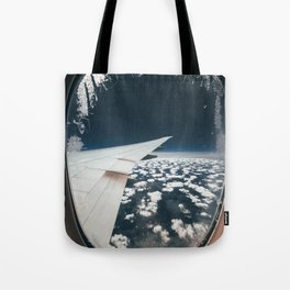 Airplane window and white clouds Tote Bag