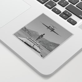 Steady As She Goes; aircraft coming in for an island landing black and white photography- photographs Sticker