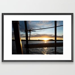 Sunset above the sea onboard a sailboat Framed Art Print
