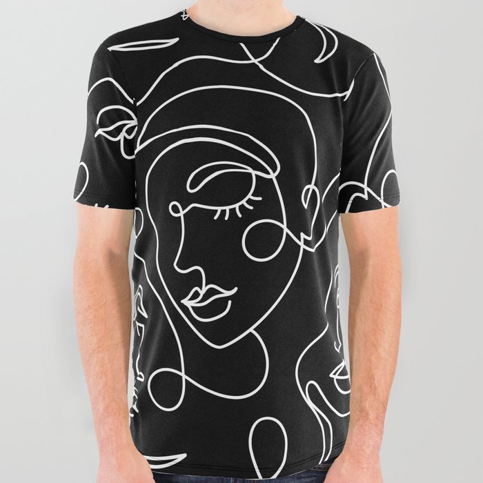 Seamless pattern with abstract faces on black. All Over Graphic Tee