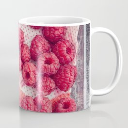 Raspberries in plastic container Coffee Mug