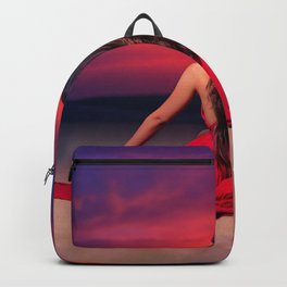 Another tequila sunrise; woman watching purple and pink sunrise in the desert magical realism female portrait color photograph / photography Backpack