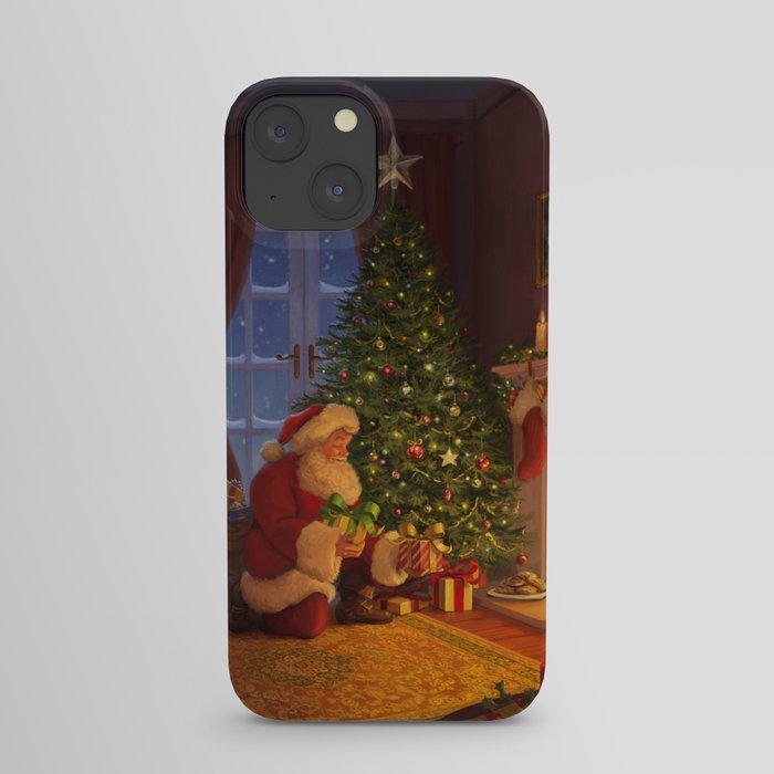 Santa putting presents by the tree iPhone Case