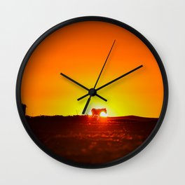 Sunset behind a horse Wall Clock