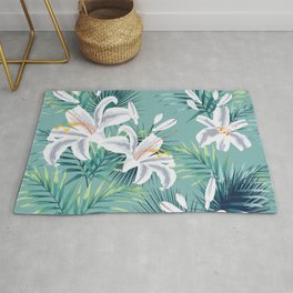 Seamless pattern with tropical leaves and royal white lilies flowers. Dark and bright green palm leaves on the mint background. Tropical illustration. Jungle foliage.  Rug