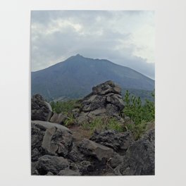 volcanic rocks in front of sakurajima volcano japan Poster