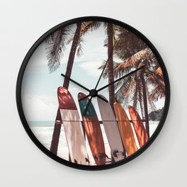 Surfboard and palm tree on summer beach. Travel adventure sport and summer vacation concept. Vintage tone filter effect color style. Wall Clock