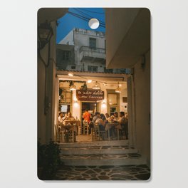 An Evening in the Greek Streets of Naxos | Warm Yellow Cafe in Dark Blue Night | Summer Nights with Dinner in South Europe | Travel Photography Cutting Board