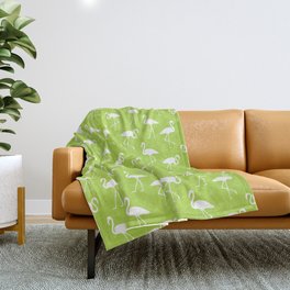 White flamingo silhouettes seamless pattern on apple green background Throw Blanket