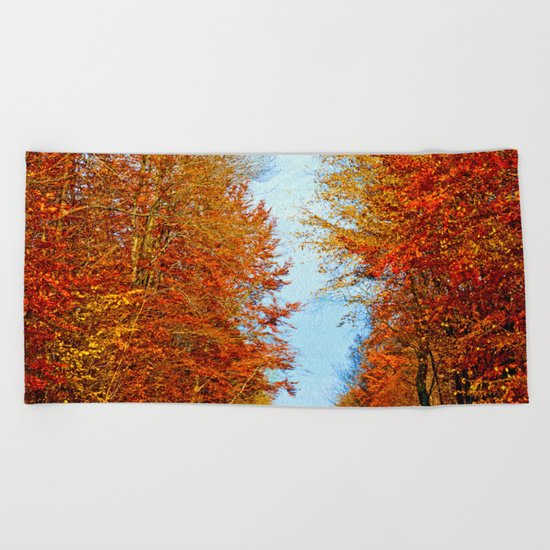 Through the fall Beach Towel