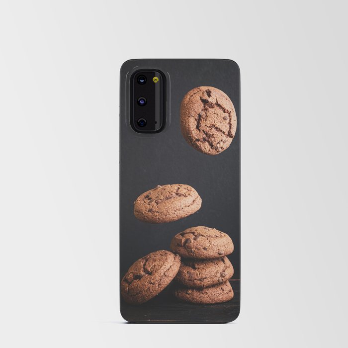 Delicious fresh chocolate cookies stacked on a wooden table Android Card Case